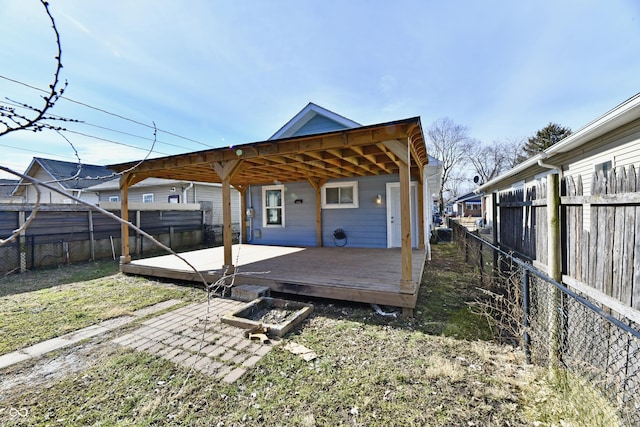 rear view of house with a deck