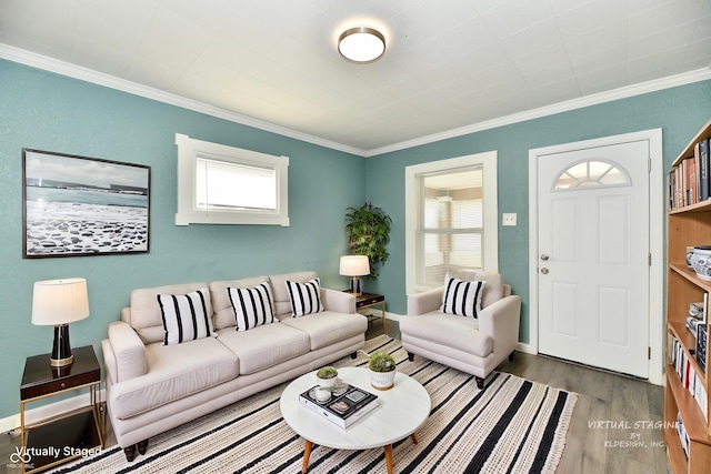 living room featuring crown molding and light wood-type flooring