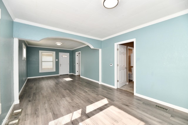 entrance foyer featuring hardwood / wood-style floors and ornamental molding