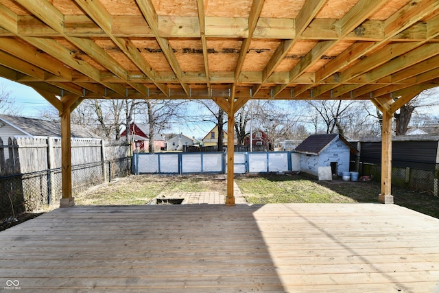 deck featuring a shed