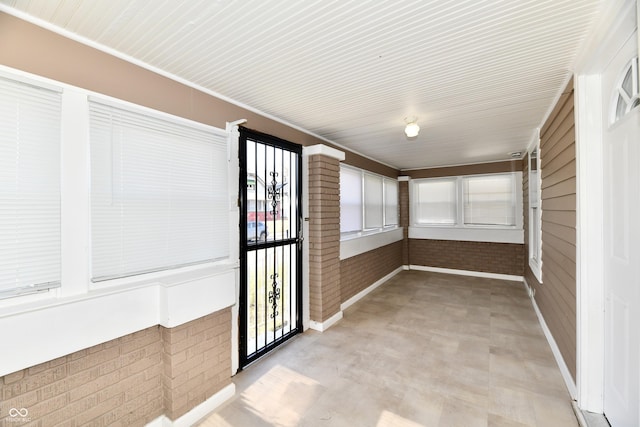 view of unfurnished sunroom