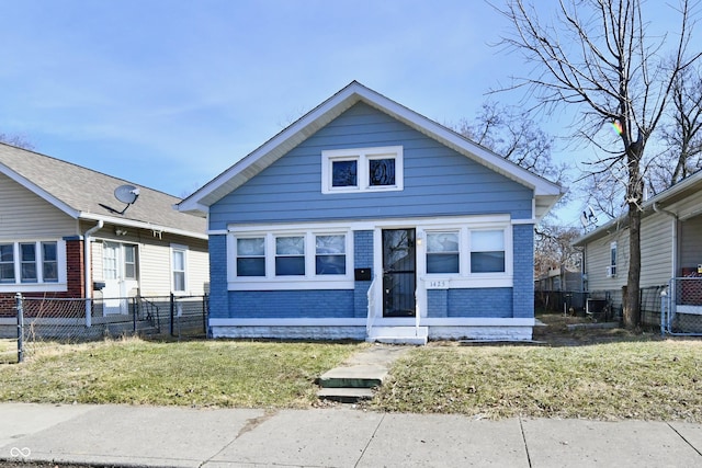 bungalow with a front lawn