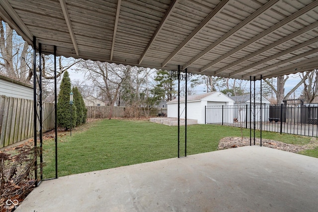 view of patio / terrace featuring a garage and an outdoor structure