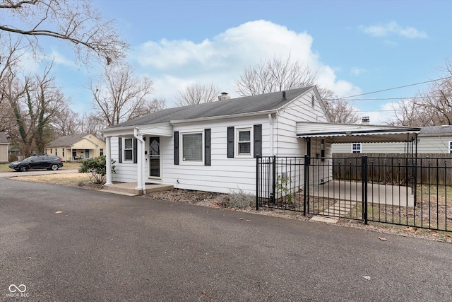 view of front of property with a carport