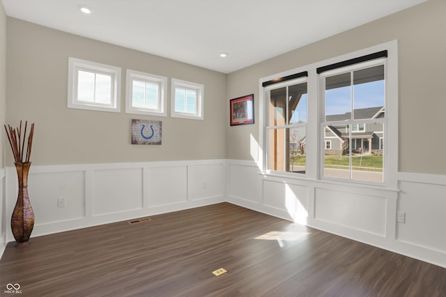 empty room featuring dark hardwood / wood-style floors