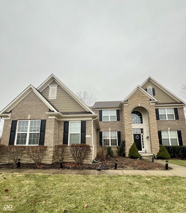 view of front of home featuring a front lawn