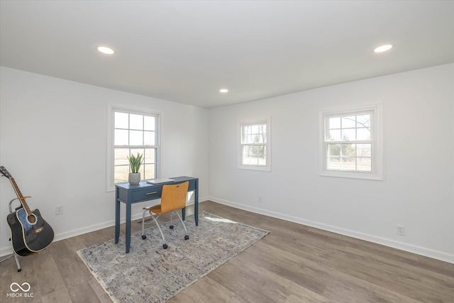 office space with hardwood / wood-style flooring