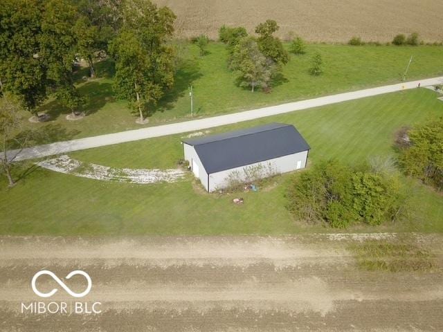 birds eye view of property featuring a rural view