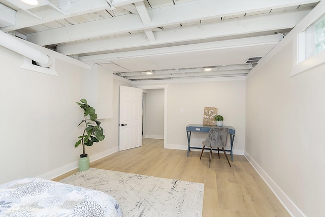 bedroom featuring hardwood / wood-style flooring