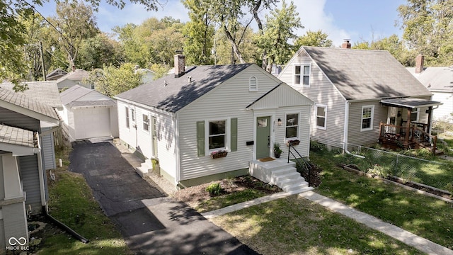 view of front of house featuring an outbuilding and a garage