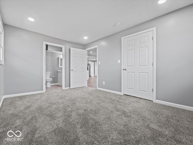 7279 W State Road 44, Shelbyville, IN 46176 - unfurnished bedroom with ensuite bathroom and carpet floors
