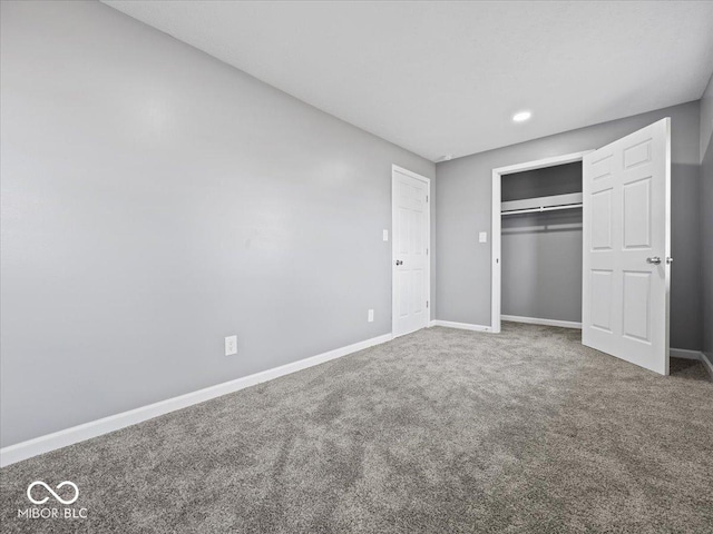 7279 W State Road 44, Shelbyville, IN 46176 - unfurnished bedroom featuring carpet flooring and a closet
