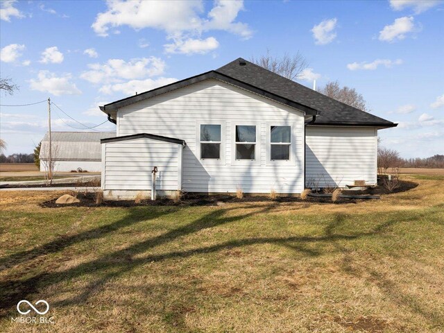 7279 W State Road 44, Shelbyville, IN 46176 - back of house featuring a yard