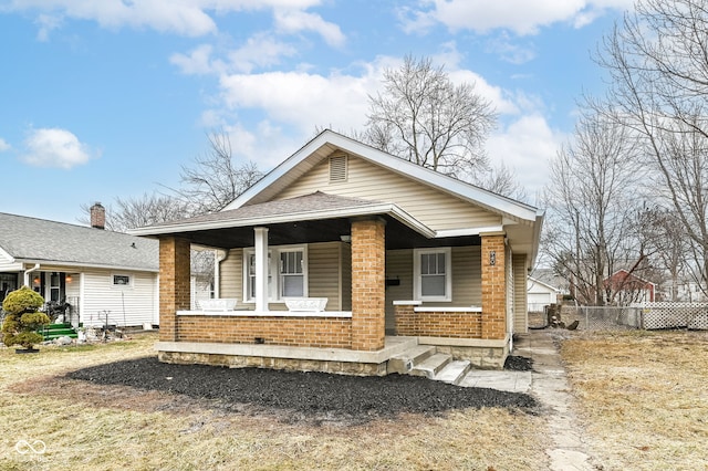 bungalow-style house featuring covered porch