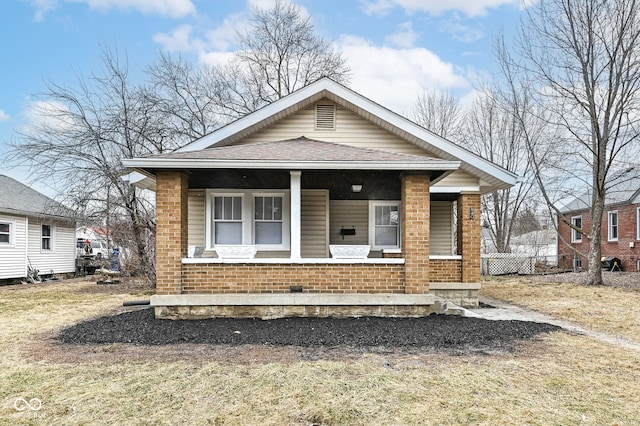 bungalow-style home featuring a porch