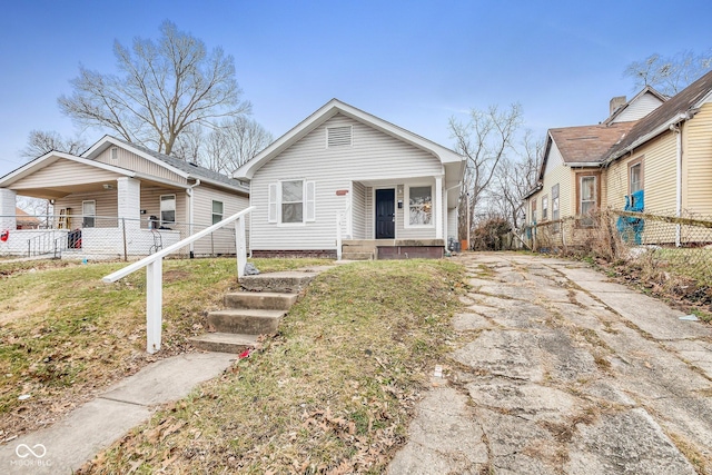 bungalow-style home with covered porch