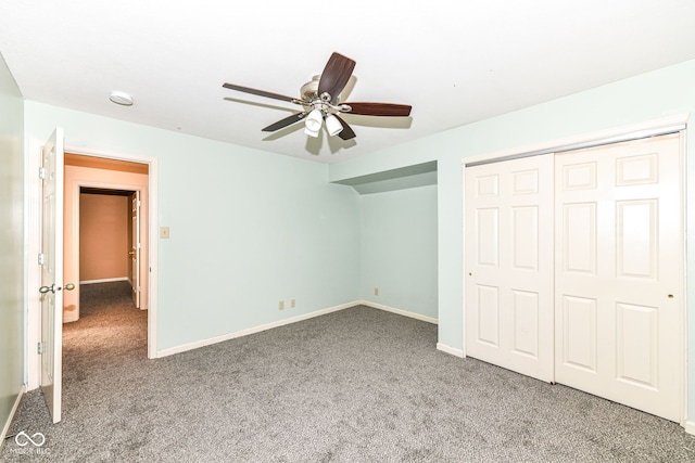 unfurnished bedroom featuring a closet, ceiling fan, and carpet flooring