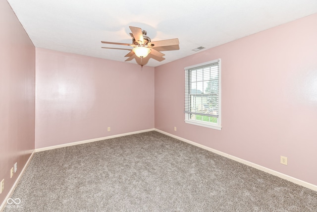 unfurnished room featuring carpet floors and ceiling fan