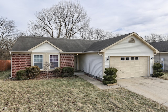 ranch-style home with a garage and a front yard