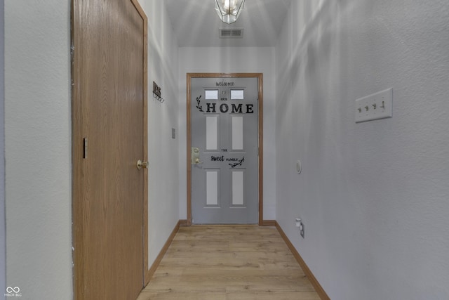 hall featuring light hardwood / wood-style flooring