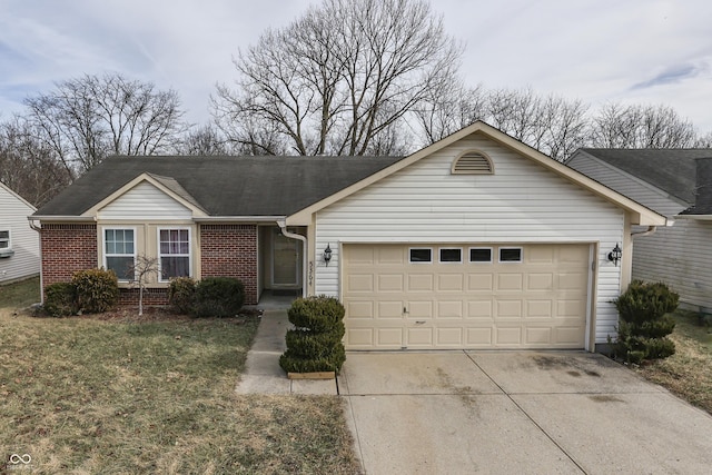 ranch-style home featuring a garage and a front lawn