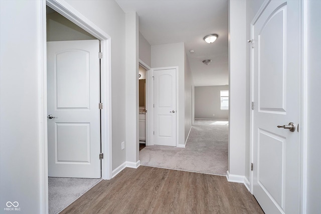 hallway featuring light wood-type flooring