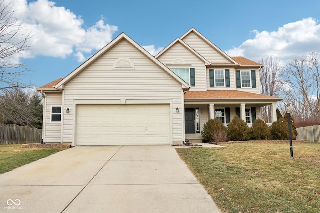 view of front of property with a garage, a front yard, and a porch