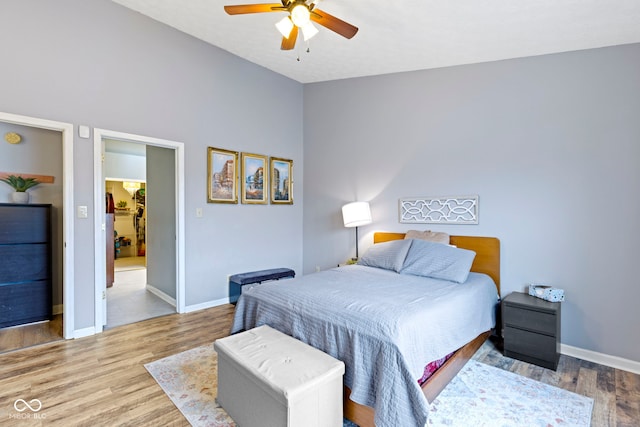 bedroom with hardwood / wood-style flooring and ceiling fan