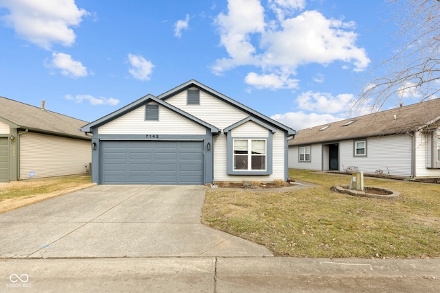 ranch-style house featuring a garage and a front lawn