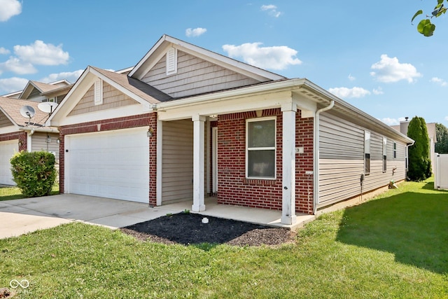 view of front of property with a garage and a front yard