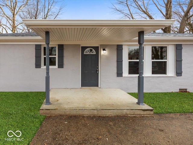 property entrance with a patio