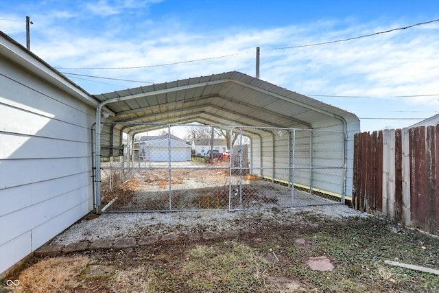 view of vehicle parking with a carport