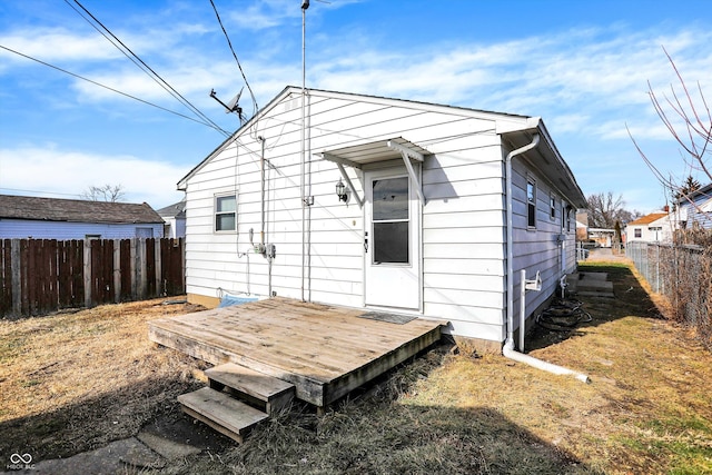 rear view of house with a deck