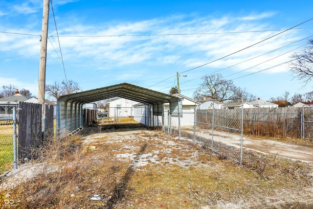 exterior space with a carport