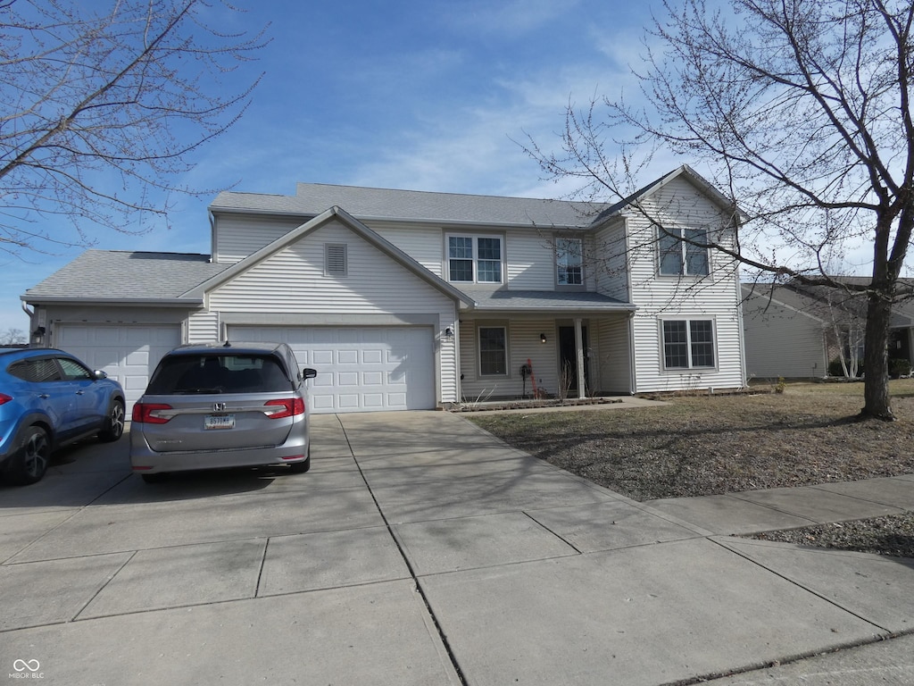 front of property featuring a garage