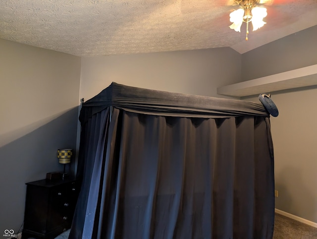 interior space featuring a textured ceiling