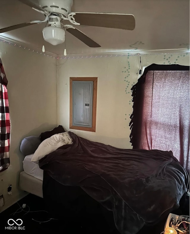 210 N Wayne St, Van Buren, IN 46991 - bedroom featuring electric panel and a ceiling fan