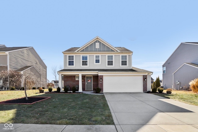 view of front facade with a garage and a front yard