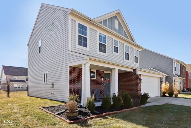 view of front of home with a garage and a front lawn