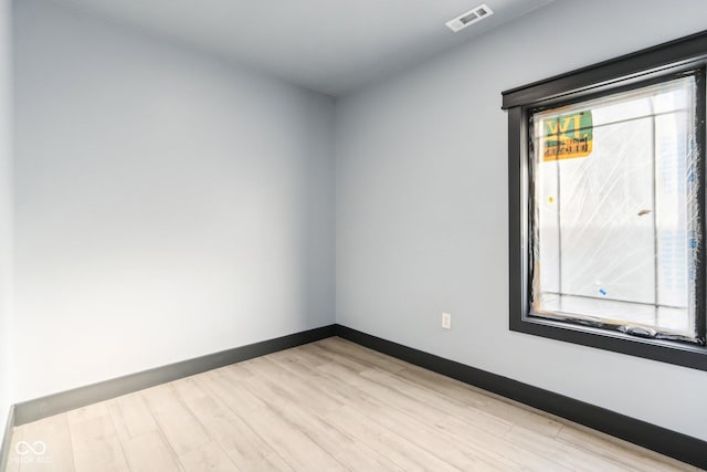 3707 N Kenwood Ave, Indianapolis, IN 46208 - empty room with light hardwood / wood-style flooring and plenty of natural light