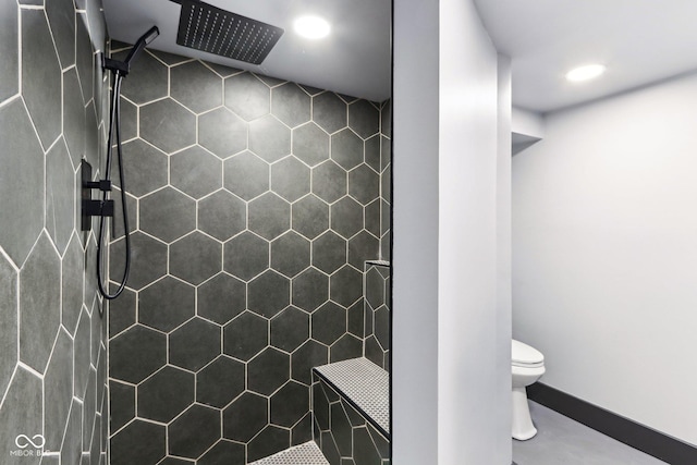 3707 N Kenwood Ave, Indianapolis, IN 46208 - bathroom featuring a tile shower and toilet