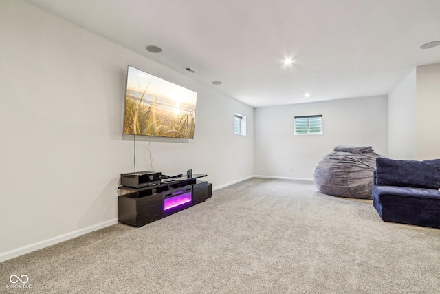 living area with carpet flooring