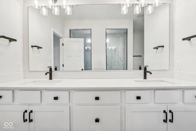 bathroom featuring vanity and a shower