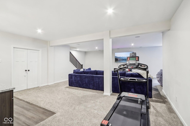 workout area with light colored carpet