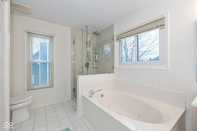 full bathroom with separate shower and tub, tile patterned floors, and a textured ceiling