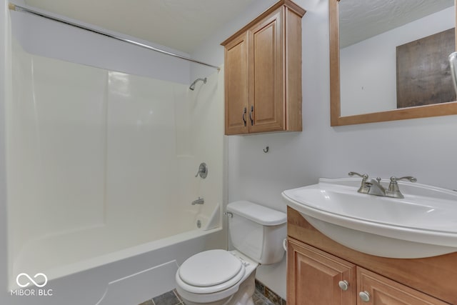 full bathroom featuring vanity, toilet, and washtub / shower combination