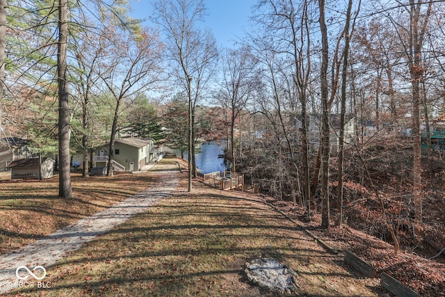 view of yard with a water view