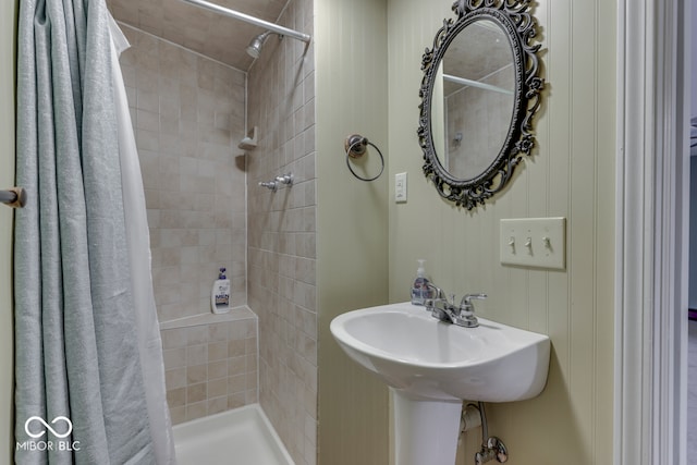 bathroom with a shower with curtain