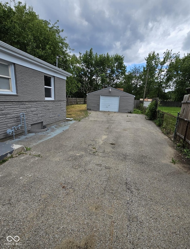 2414 Walker Ave, Indianapolis, IN 46203 - detached garage with driveway