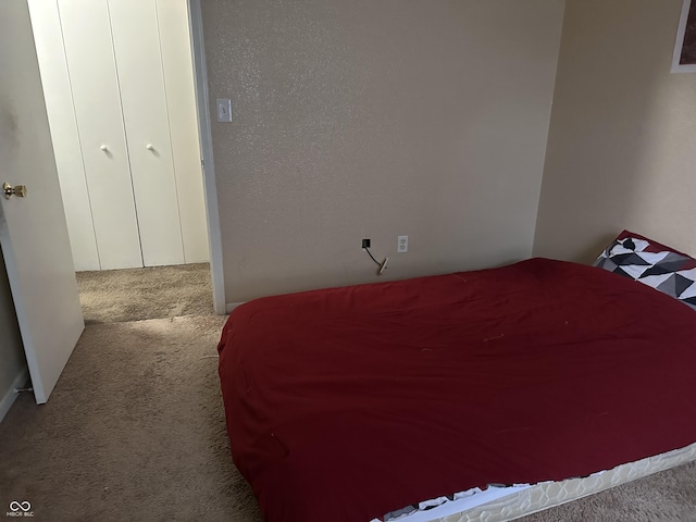 bedroom with light carpet